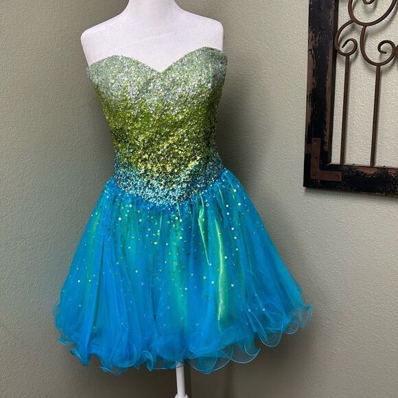 Jovani Dresses & Skirts - Jovani sparkling sleeveless mini party dress